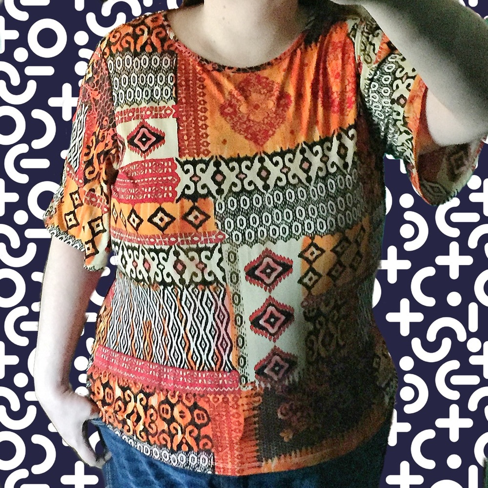 💰2/$8💰 Orange Patterned Top